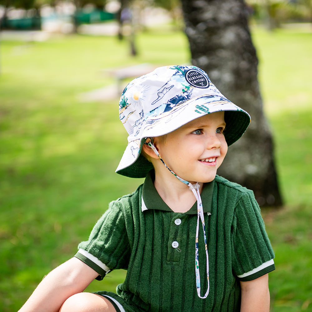 Child wearing a Little Renegade Bucket Hat outdoors