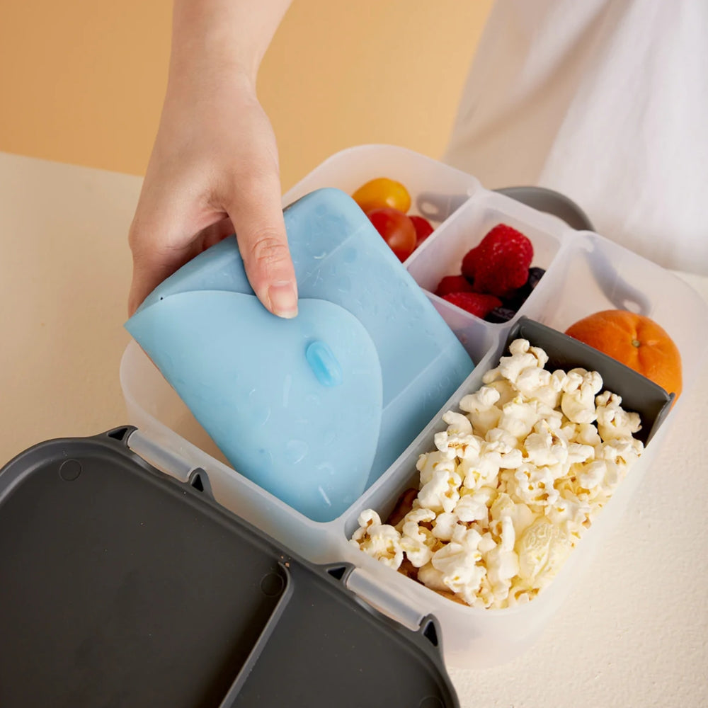 Reusable b.box lunch containers and silicone lunch accessories in use