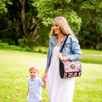 Arizona Adventure Mat folded into its built-in carry bag and worn over the shoulder