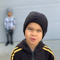 Child wearing the Black Everest Beanie outdoors