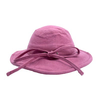 Rear view of the Musk Sun Hat showing the pink linen crown, wide brim and circumference strap