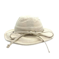 Rear view of the Oatmeal Sun Hat showing the linen texture, wide brim and circumference strap tied in a bow