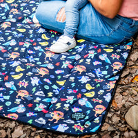 Close-up of the Superhero Pals Adventure Mat showing its colourful superhero characters on a navy background