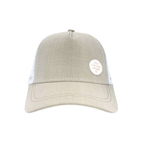 Wheat Trucker Cap front view showing its soft wheat-toned front, curved peak and white mesh sides